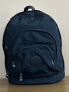 Kipling Harper Nylon Backpack Front Pockets
Featuring Classic Crinkled Nylon.